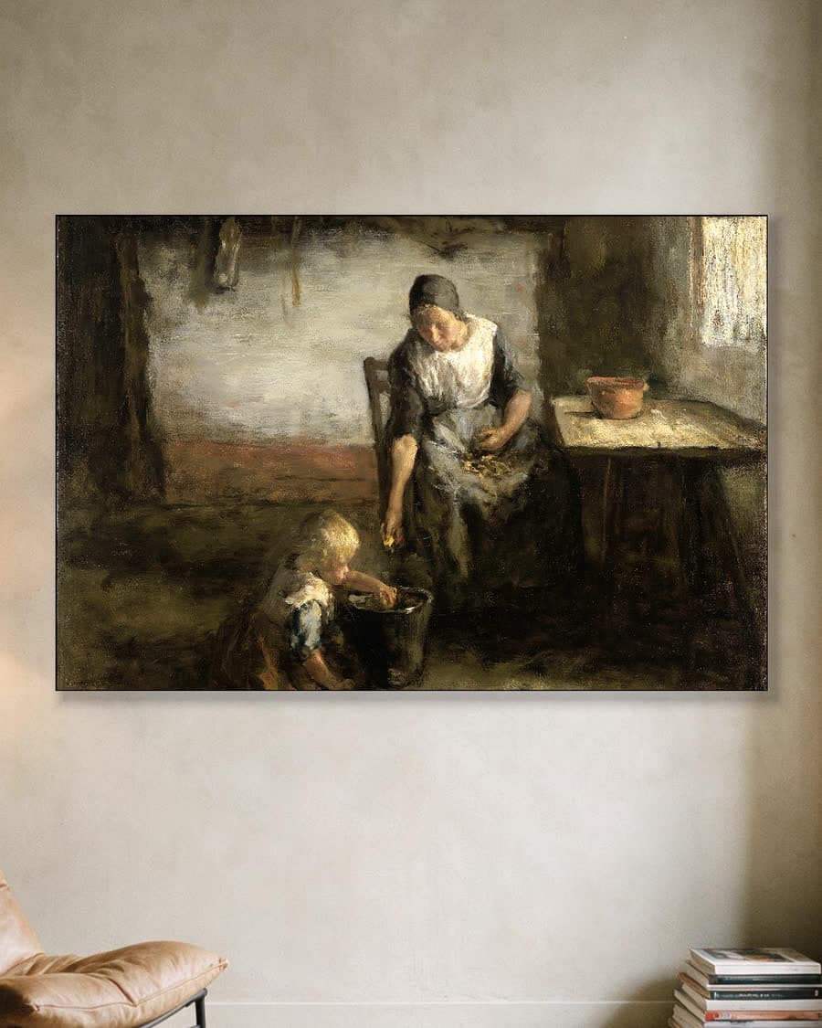 De aardappelschilster in een aluminium frame aan dezelfde muur