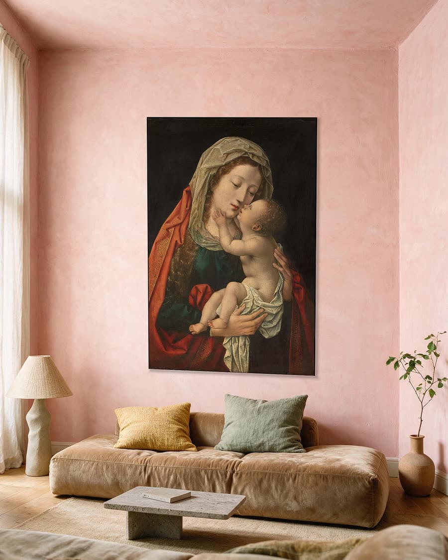 Maria met kind in een aluminium frame aan dezelfde muur