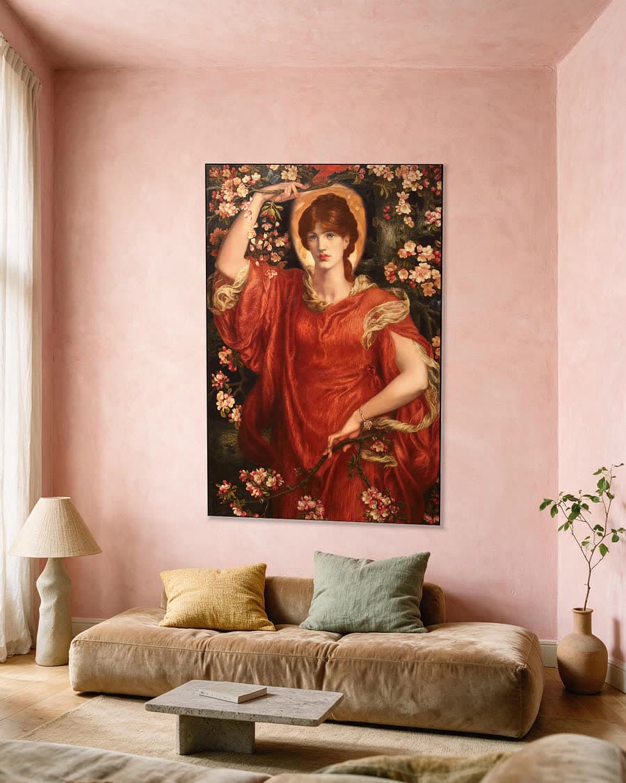 Een visioen van Fiammetta in een aluminium frame aan dezelfde muur