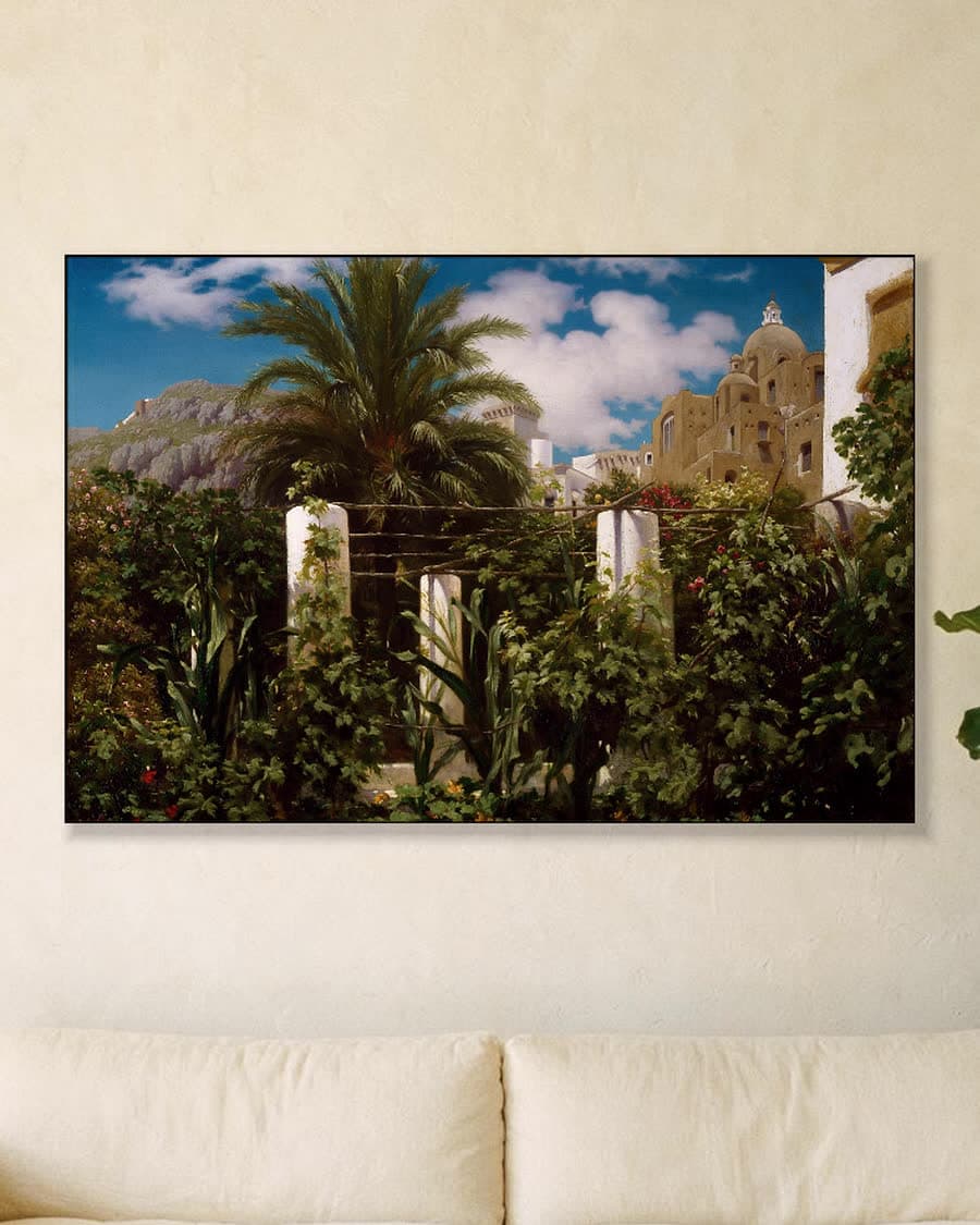 Mediterrane tuin met uitzicht in een aluminium frame aan dezelfde muur