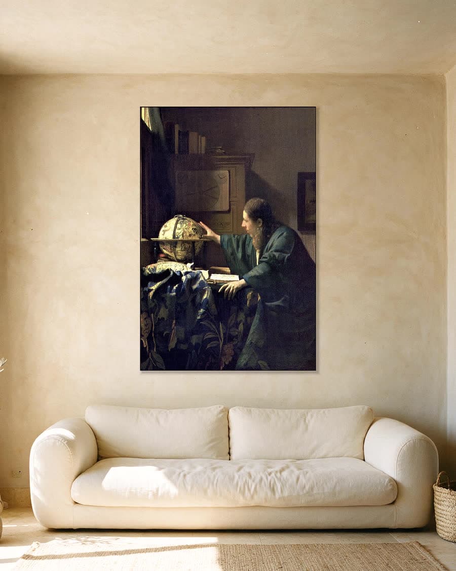 De Astronoom in een aluminium frame aan dezelfde muur