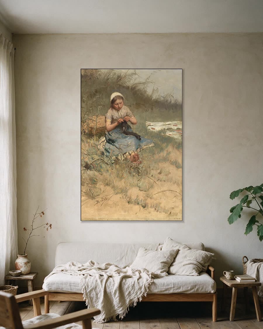 Het breistertje in een aluminium frame aan dezelfde muur