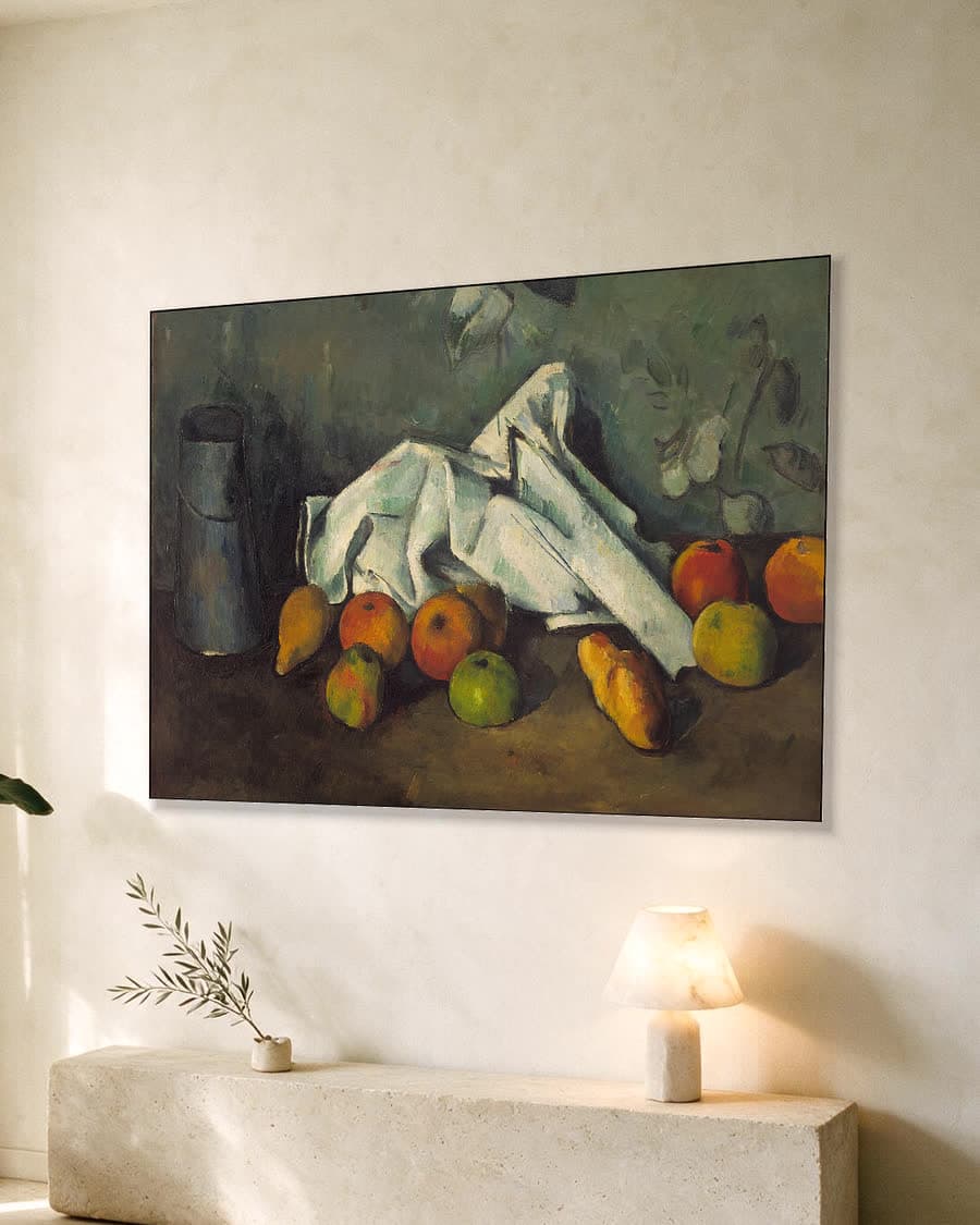 Melkkan en appels in een aluminium frame aan dezelfde muur
