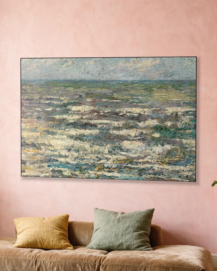 De zee bij Katwijk in een aluminium frame aan dezelfde muur