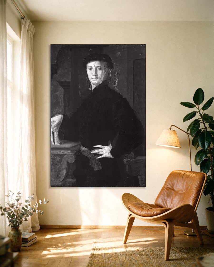 Portret van een jongeman in een aluminium frame aan dezelfde muur