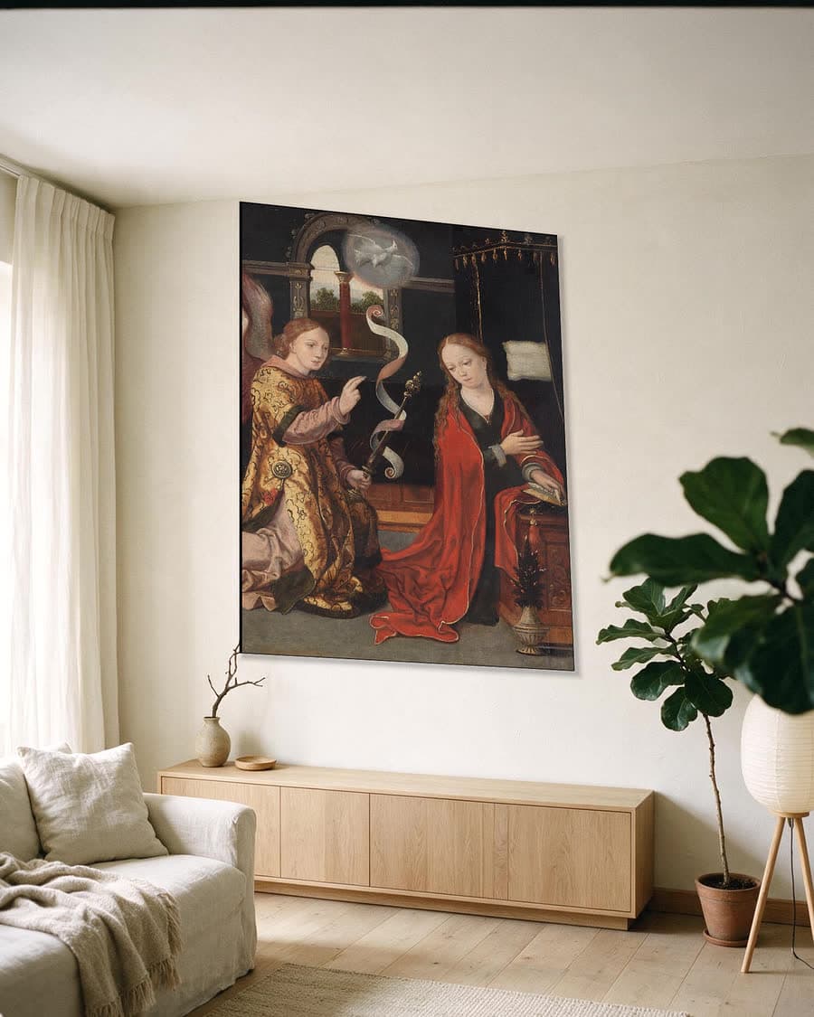 De annunciatie in een aluminium frame aan dezelfde muur