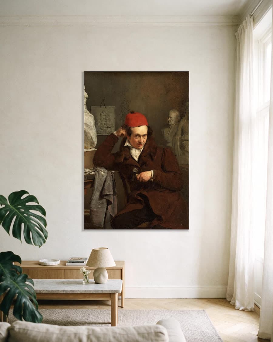 Portret van Louis Royer, beeldhouwer in een aluminium frame aan dezelfde muur