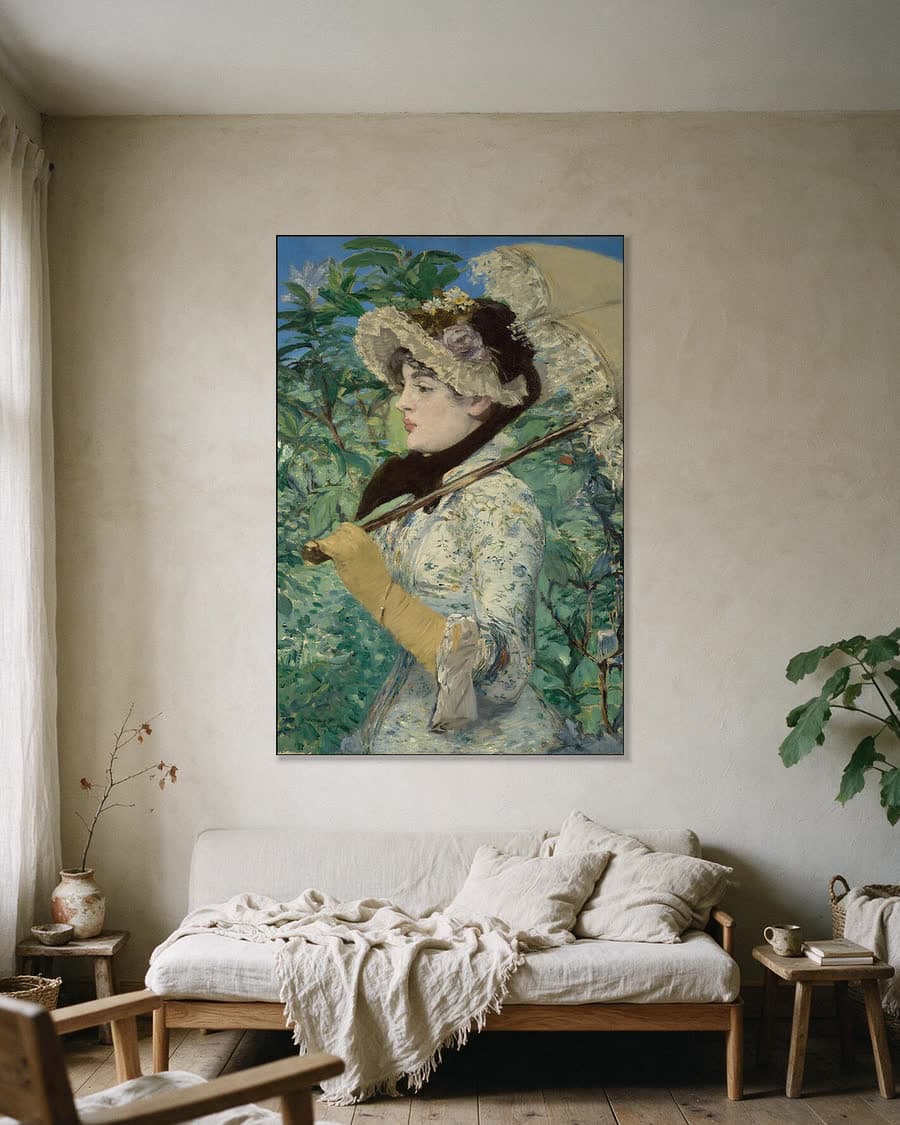 De lente (Jeanne Demarsy) in een aluminium frame aan dezelfde muur