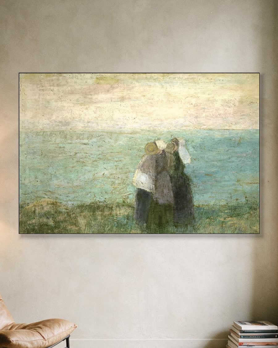 Vrouwen aan zee in een aluminium frame aan dezelfde muur