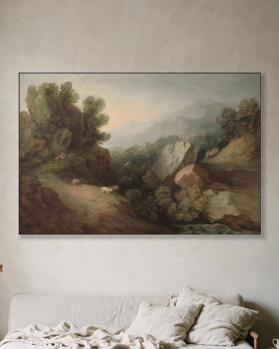 Rotsachtig boslandschap met een dal en een stuw in een aluminium frame aan dezelfde muur