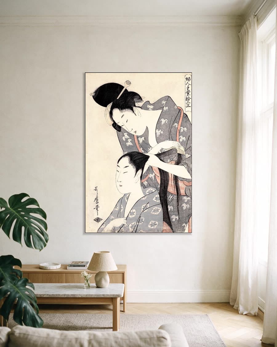 De kapster in een aluminium frame aan dezelfde muur
