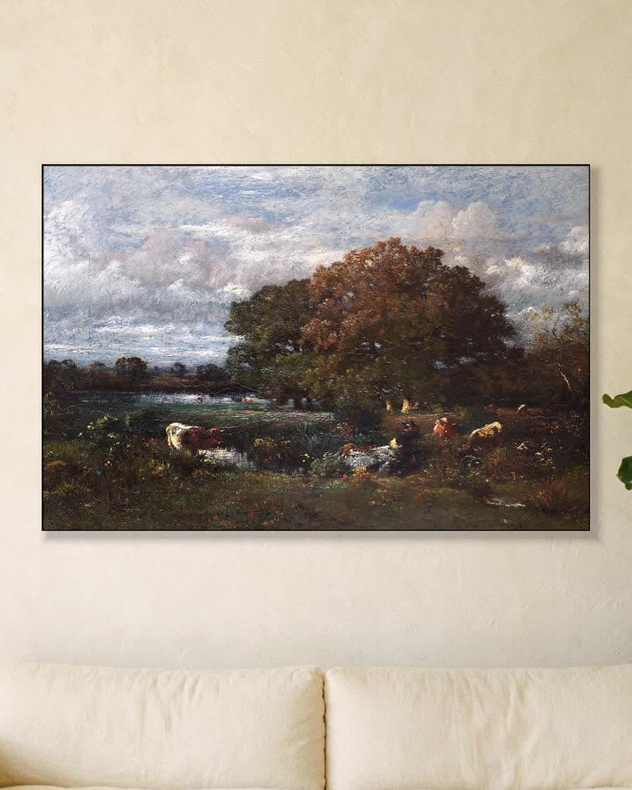 Koeien aan de waterkant in een aluminium frame aan dezelfde muur