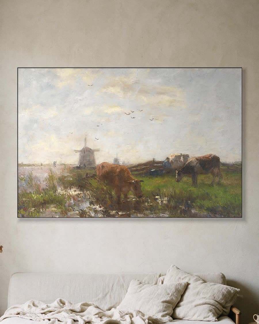 Grazend vee aan de waterkant in een aluminium frame aan dezelfde muur