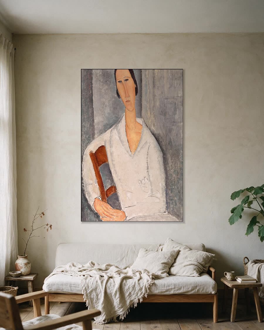 Schilderij in een aluminium frame aan dezelfde muur