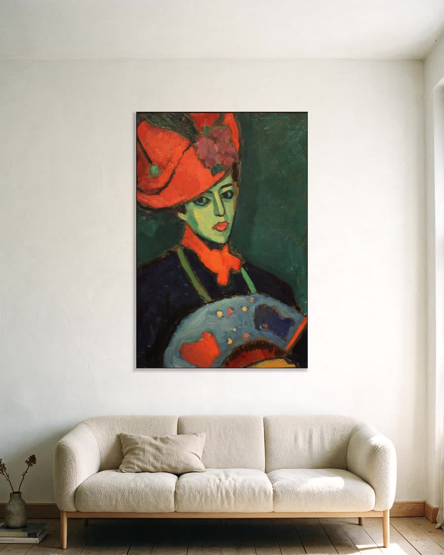 Schokko met rode hoed in een aluminium frame aan dezelfde muur
