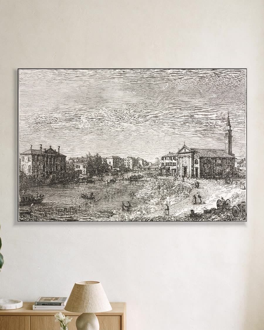 Stadsgezicht aan de rivier in een aluminium frame aan dezelfde muur