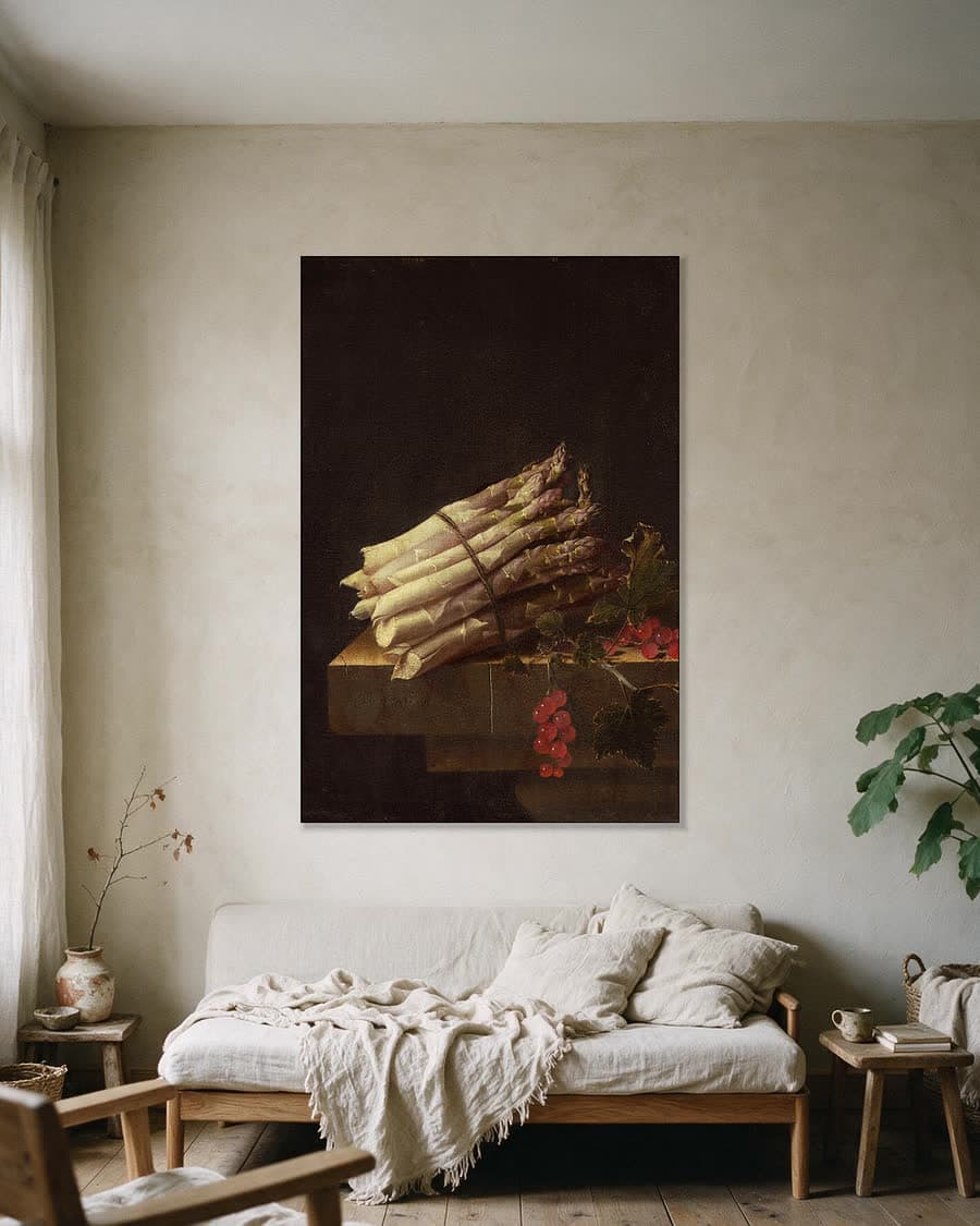 Bundel asperges in een aluminium frame aan dezelfde muur
