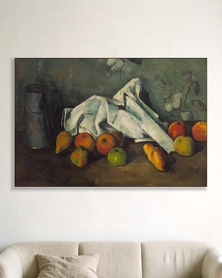 Melkkan en appels in een aluminium frame aan dezelfde muur
