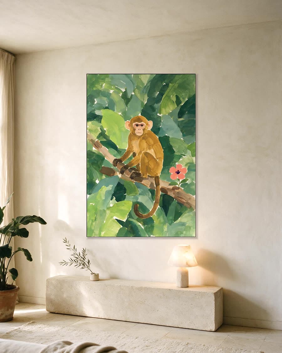 Aapje op een tak in een aluminium frame aan dezelfde muur