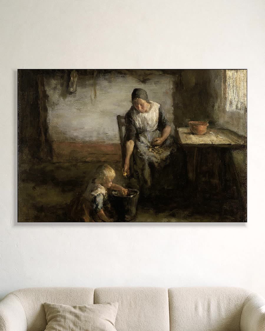 De aardappelschilster in een aluminium frame aan dezelfde muur