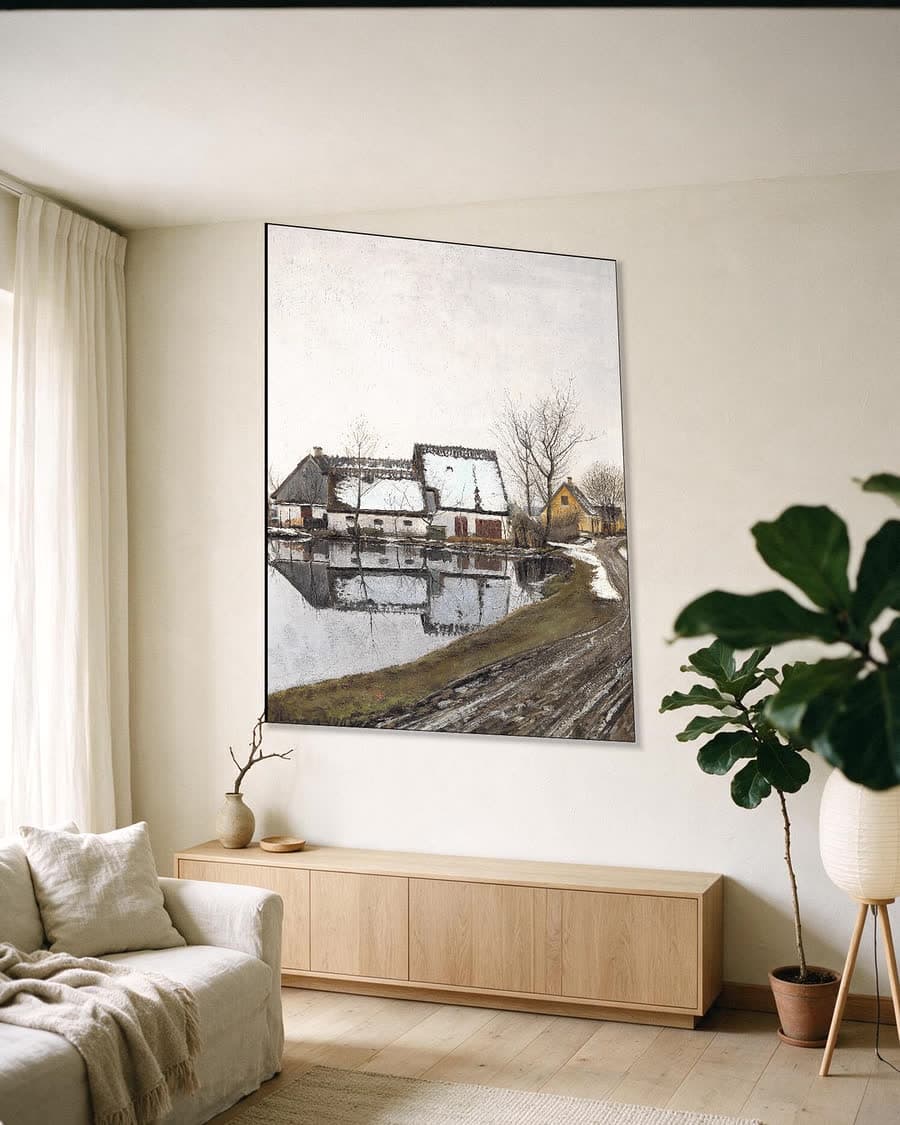Winterdag bij dooi met spiegelende huizen in een aluminium frame aan dezelfde muur