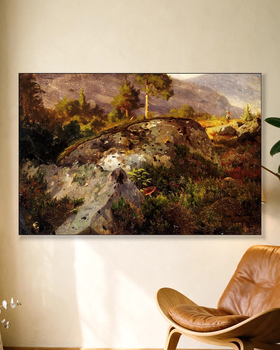 Heidelandschap met rotsen en dennen in een aluminium frame aan dezelfde muur