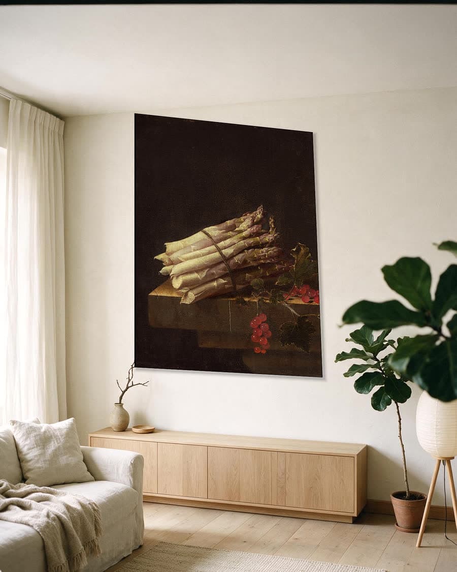 Bundel asperges in een aluminium frame aan dezelfde muur