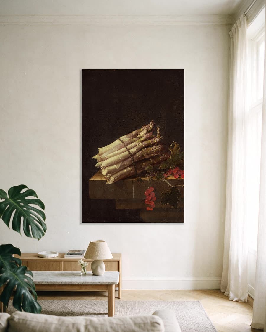 Bundel asperges in een aluminium frame aan dezelfde muur