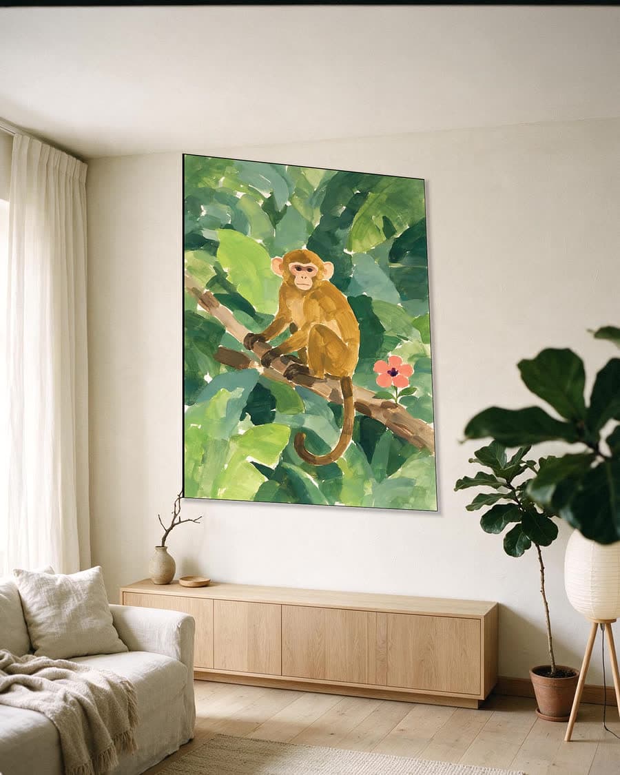 Aapje op een tak in een aluminium frame aan dezelfde muur