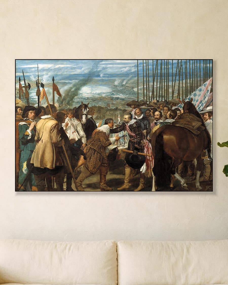 De Overgave van Breda (Las Lanzas) in een aluminium frame aan dezelfde muur