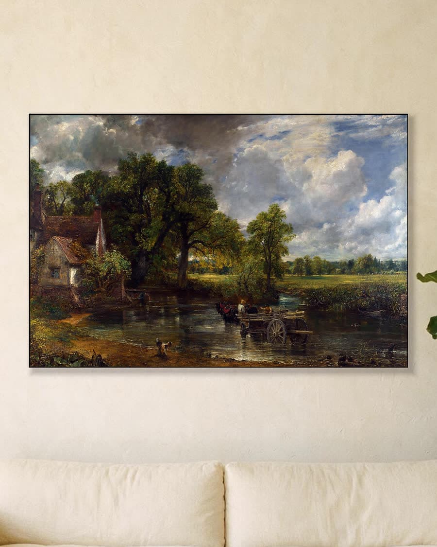 De hooiwagen in een aluminium frame aan dezelfde muur