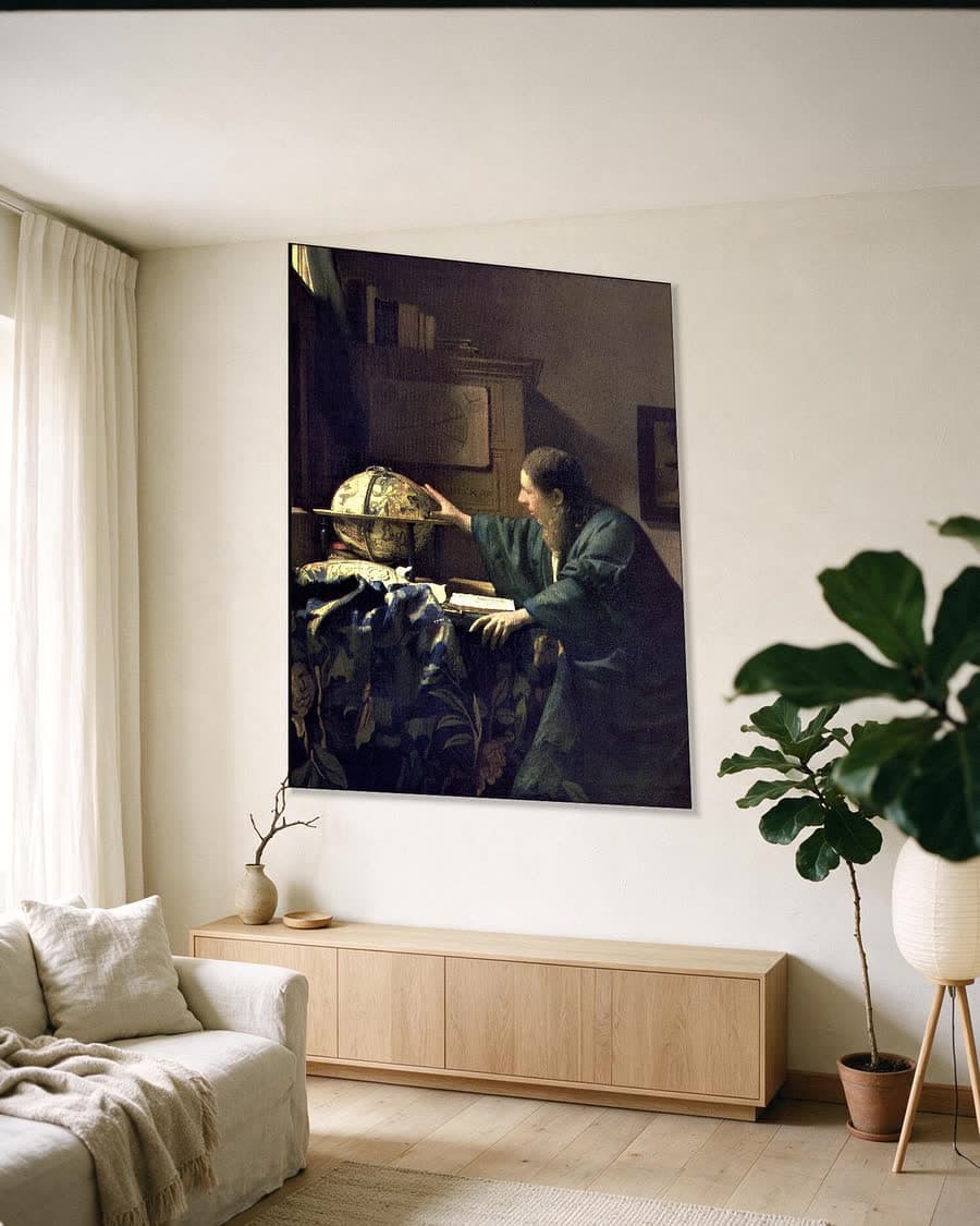 De Astronoom in een aluminium frame aan dezelfde muur