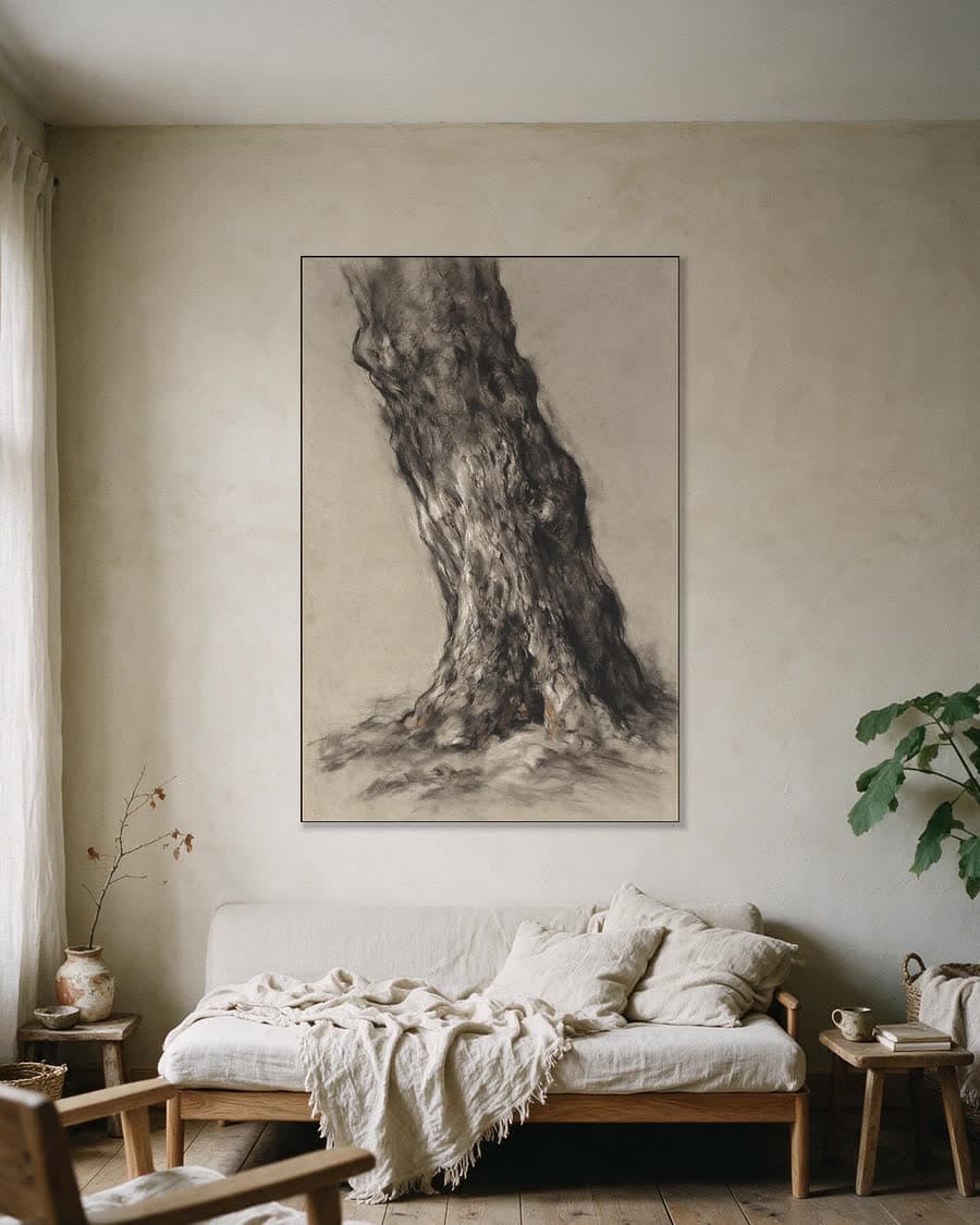 Boomstam in een aluminium frame aan dezelfde muur
