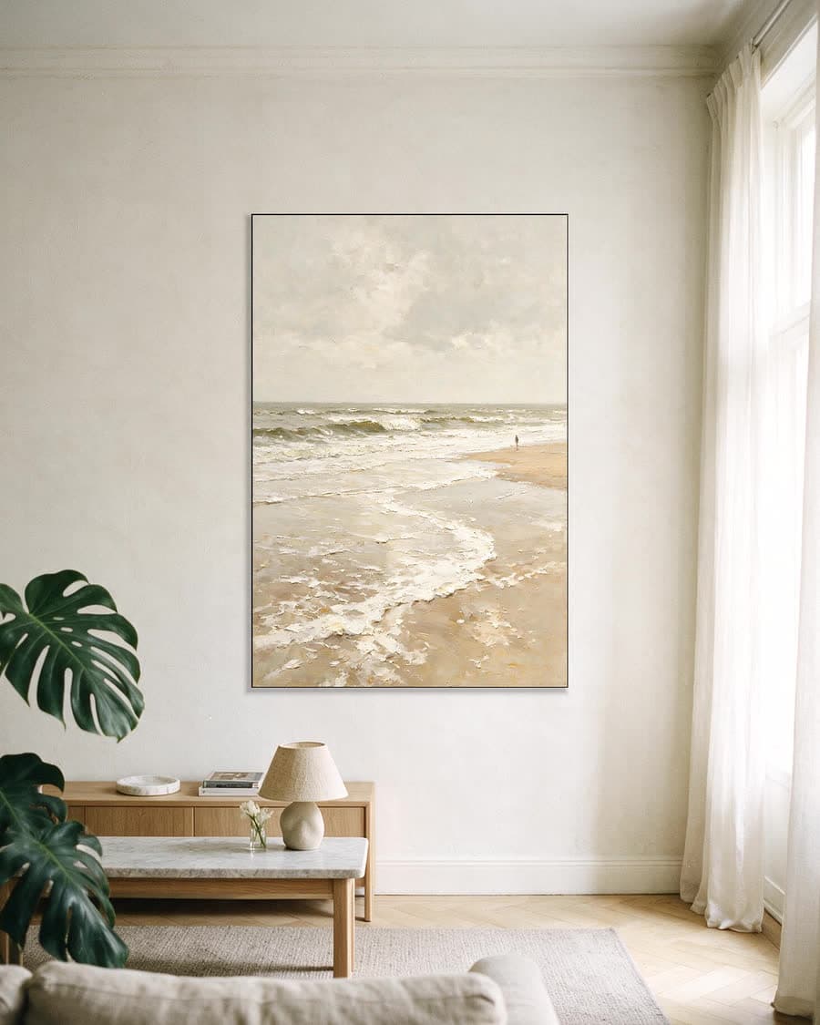 Schuim op nat zand in een aluminium frame aan dezelfde muur