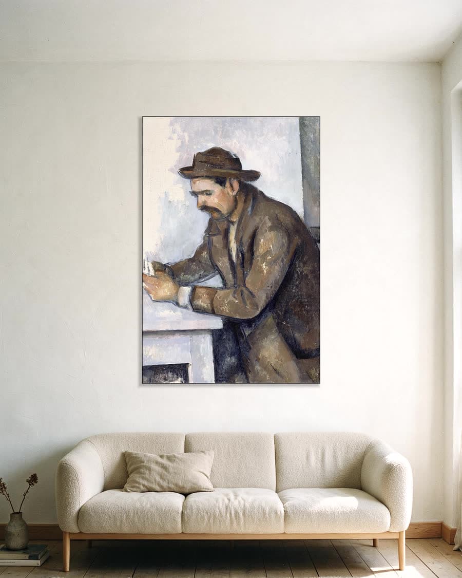 De kaartspeler in een aluminium frame aan dezelfde muur