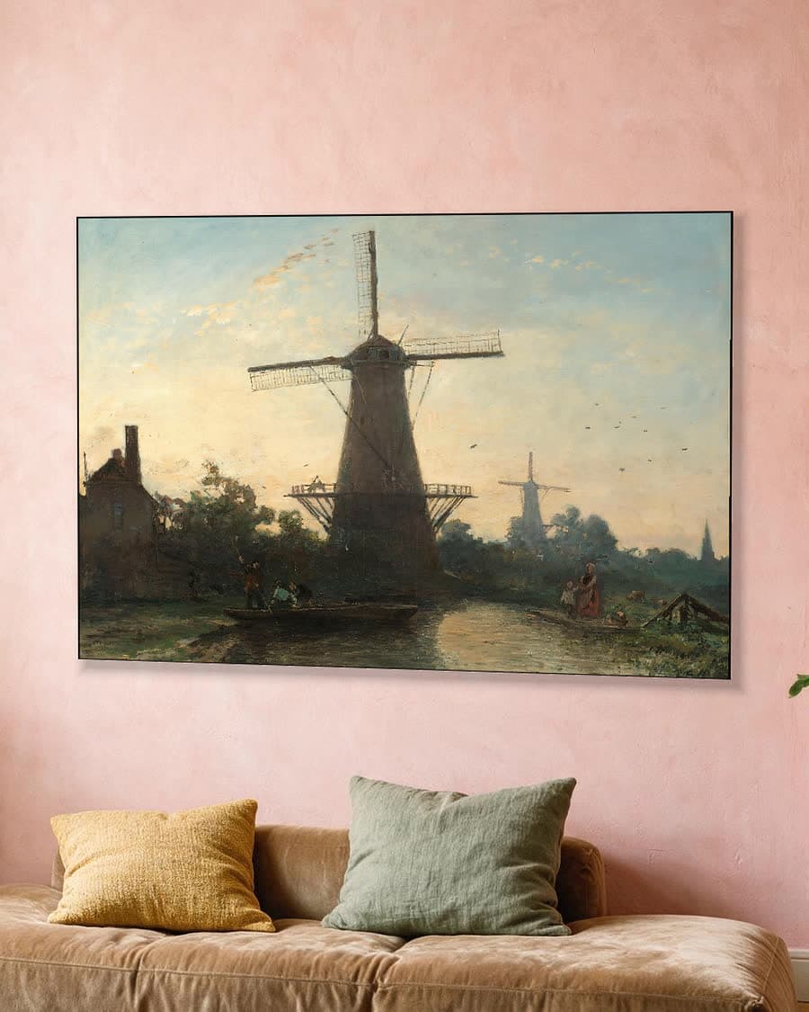 Molens bij Rotterdam in een aluminium frame aan dezelfde muur
