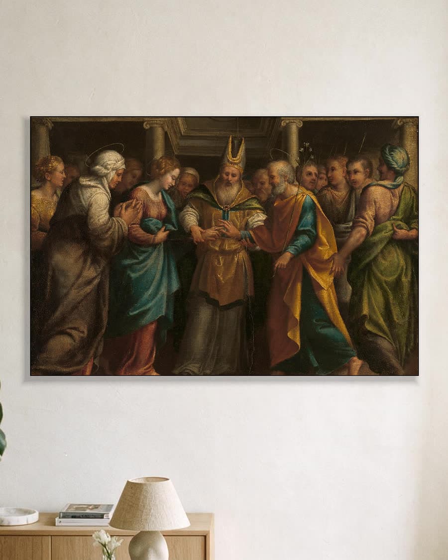 Het huwelijk van Maria met Jozef in een aluminium frame aan dezelfde muur