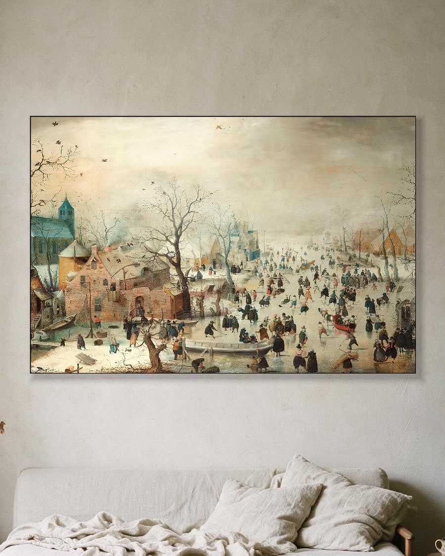 Winterlandschap met schaatsers in een aluminium frame aan dezelfde muur