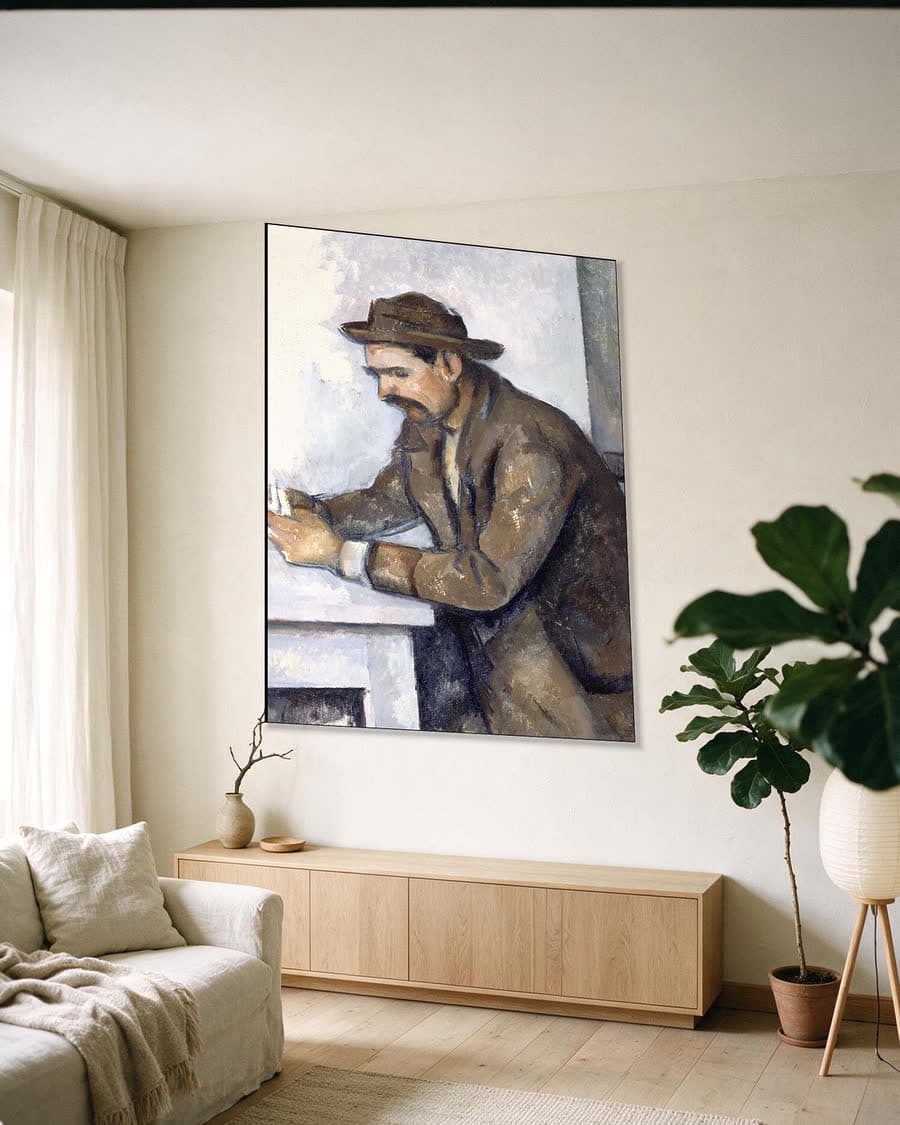 De kaartspeler in een aluminium frame aan dezelfde muur