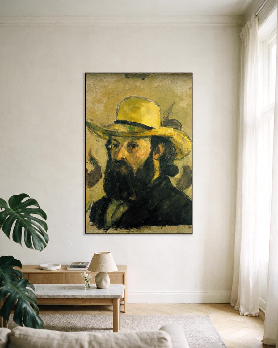 Zelfportret met strohoed in een aluminium frame aan dezelfde muur