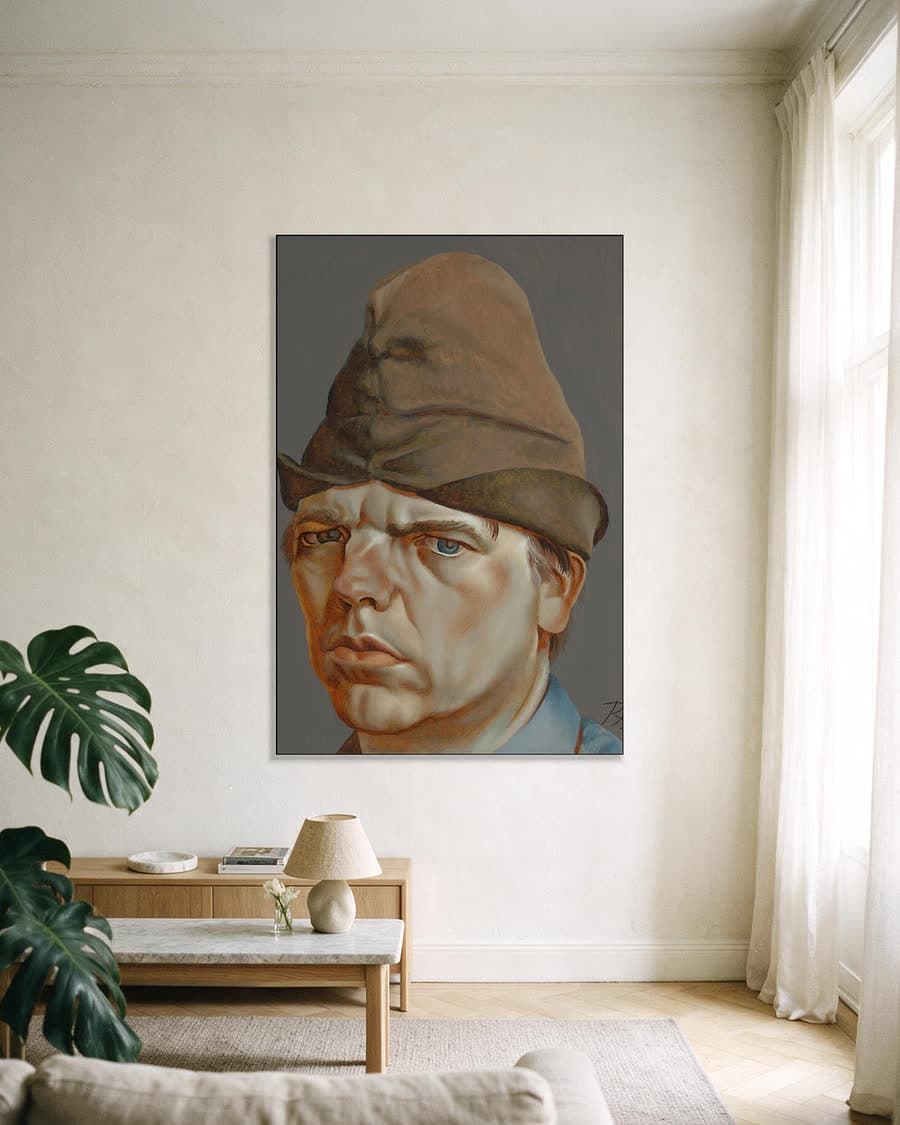 Zelfportret nr. 41 in een aluminium frame aan dezelfde muur