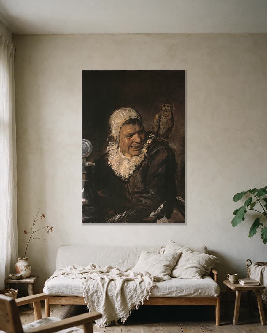 Malle Babbe in een aluminium frame aan dezelfde muur