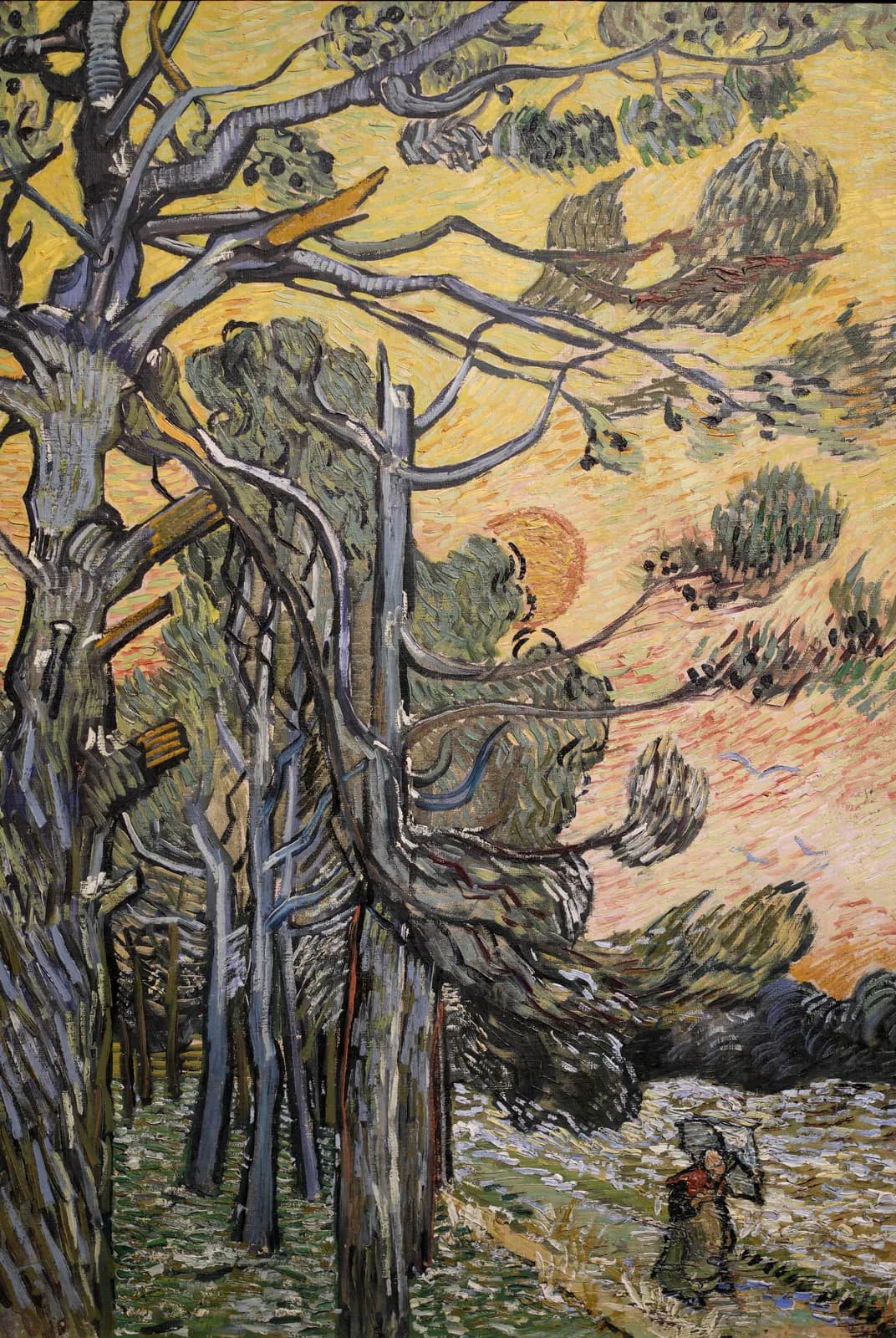 Dennenbomen bij zonsondergang – Vincent van Gogh