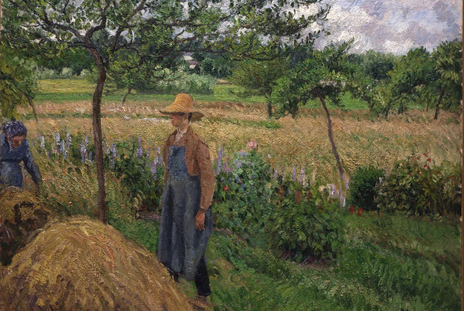Tuinman bij een hooiberg, bewolkte lucht, Éragny – Camille Pissarro