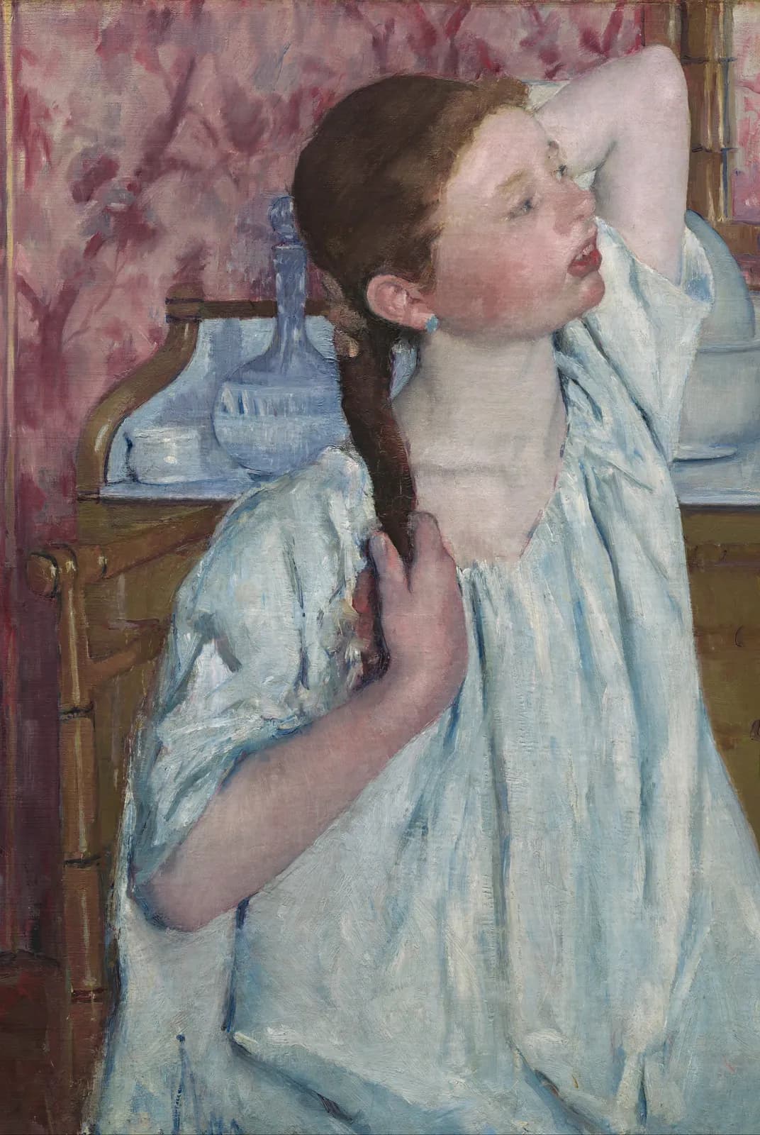 Girl Arranging Her Hair – Mary Cassatt