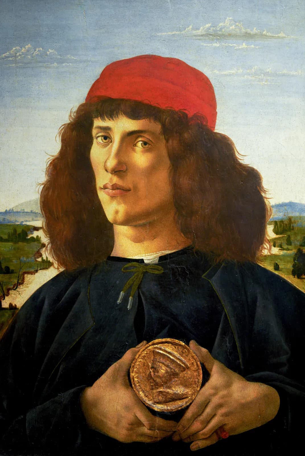 Portret van een man met een medaille van Cosimo de Oude – Sandro Botticelli