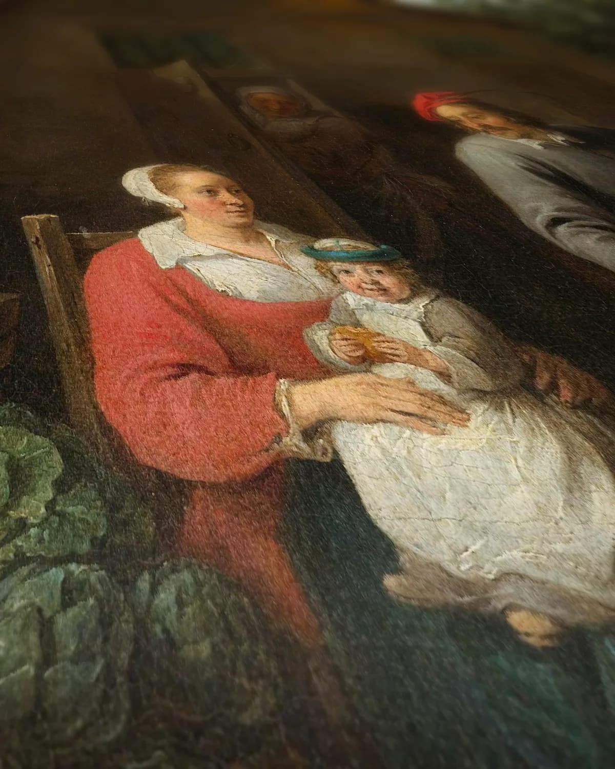 Een landman met een vrouw en kind op geweven fluweel, uitsnede 2 van 3