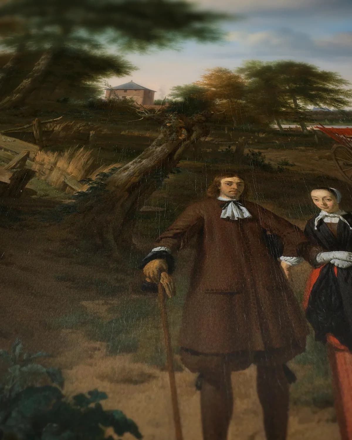 Portret van een echtpaar met twee kinderen en een min in een landschap op geweven fluweel, uitsnede 3 van 3